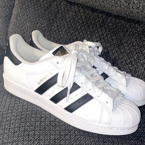 Women’s adidas superstar sneakers worn once.